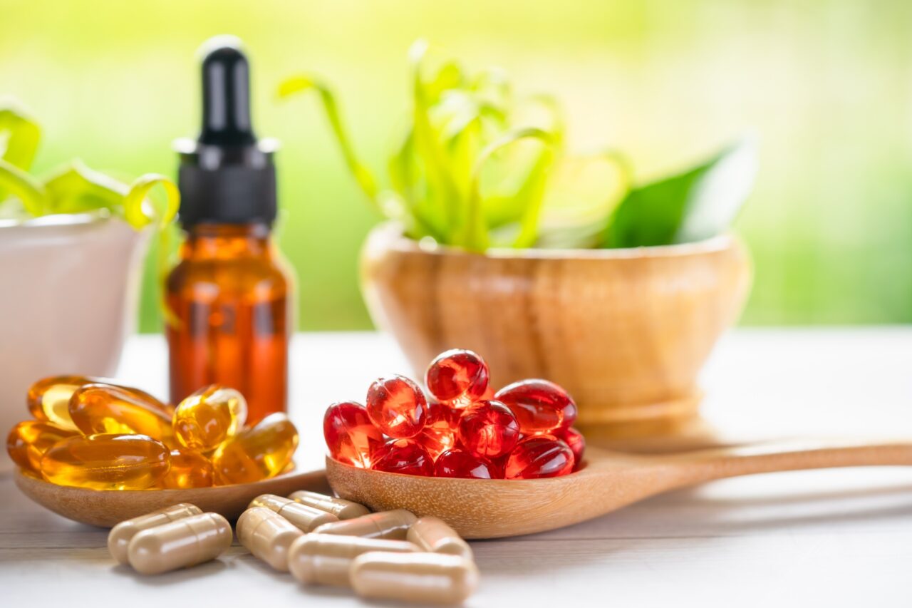 Alternative medicine nature herbal organic capsule, drug with herbs leaf